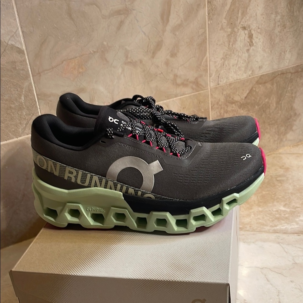 On Running Black and Mint Sneakers